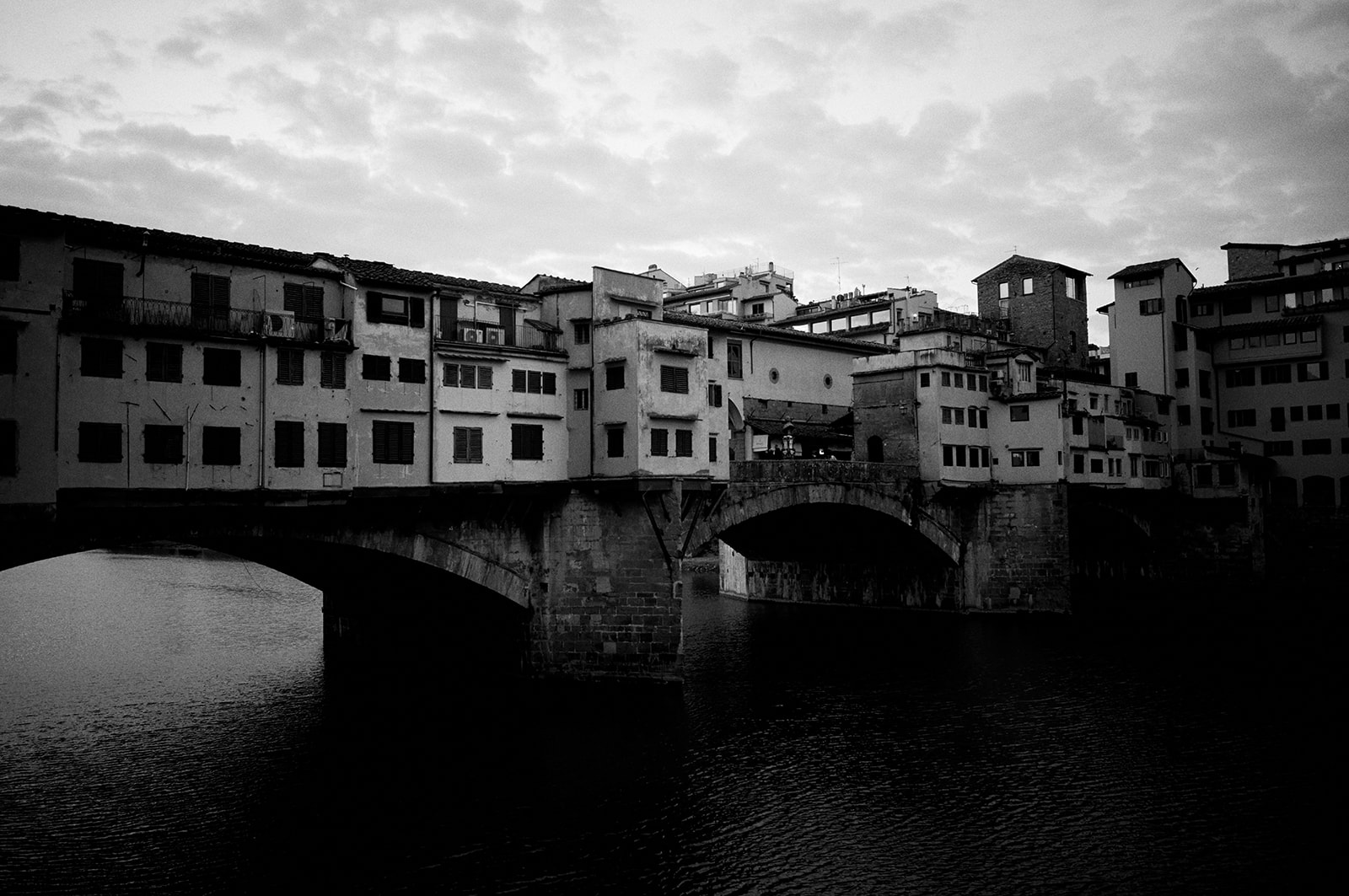 The Arno and Florence rooftops at blue hour