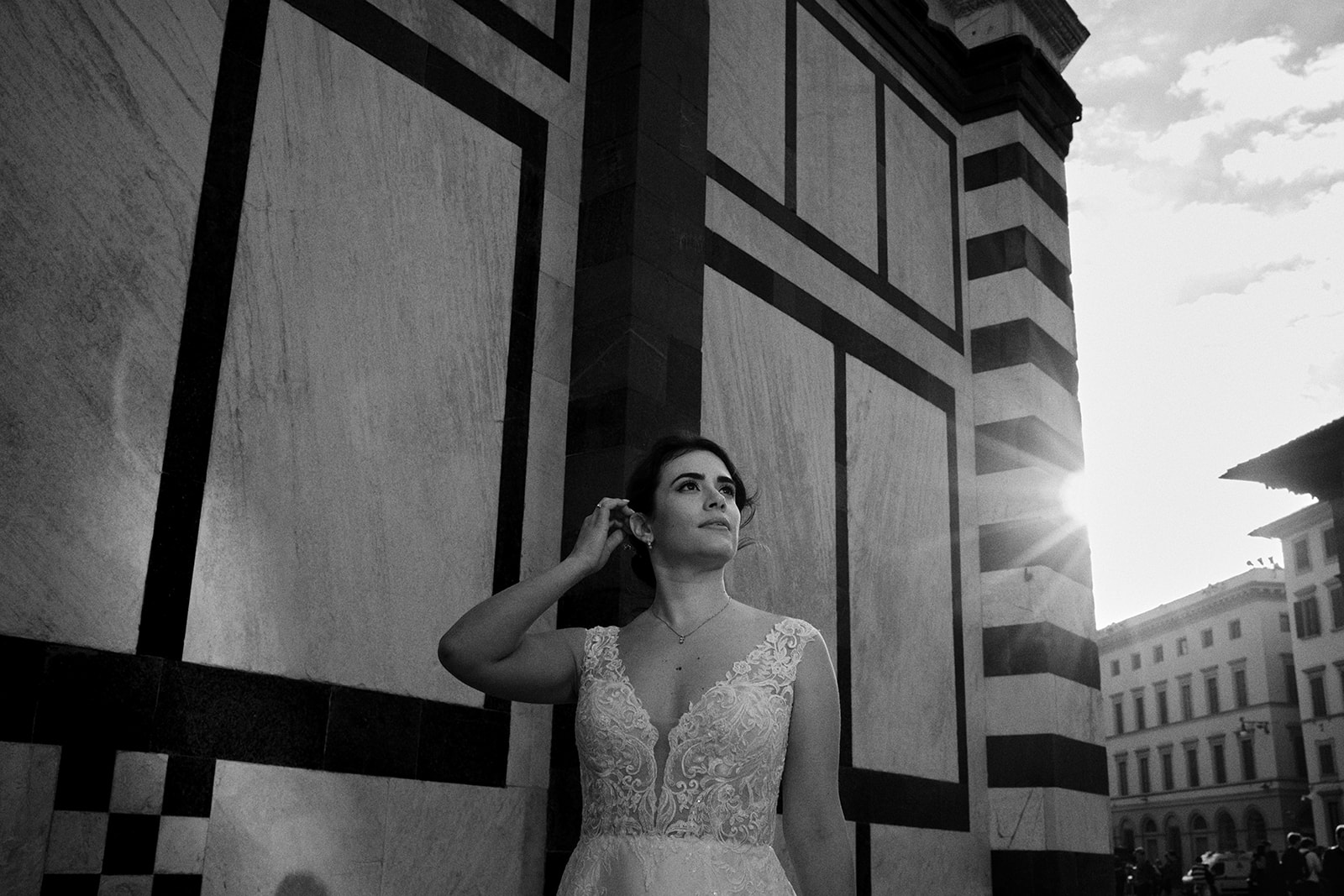 Bride in the light and shadow of the Duomo marble in Florence