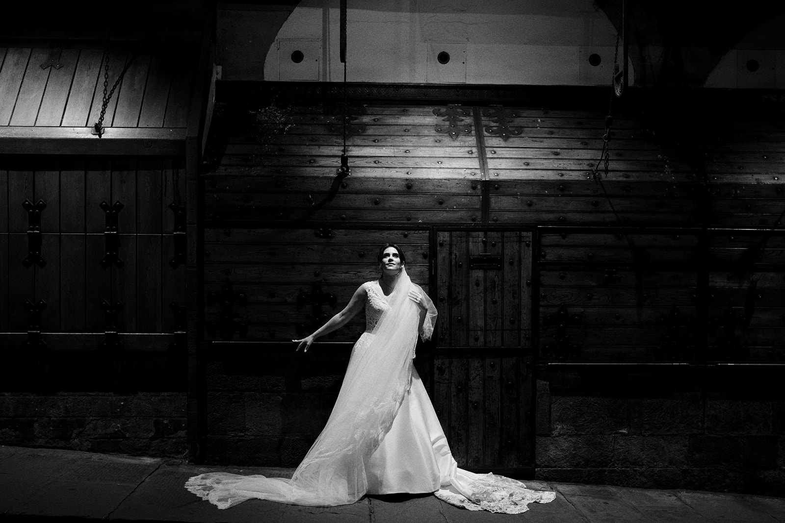 Bride in a doorway in Florence before sunrise