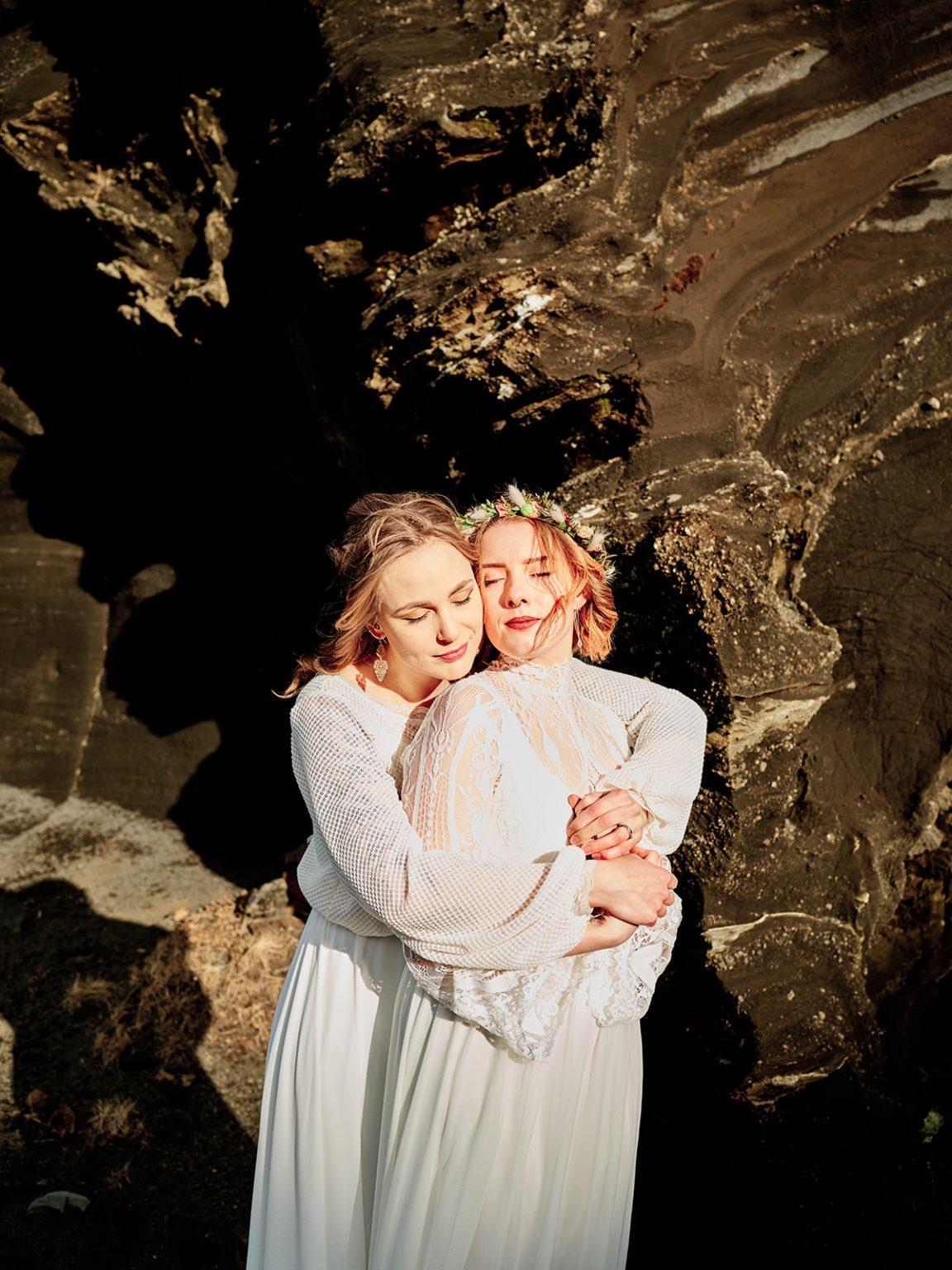 An embrace on the Reykjanes coast, gay elopement in Iceland