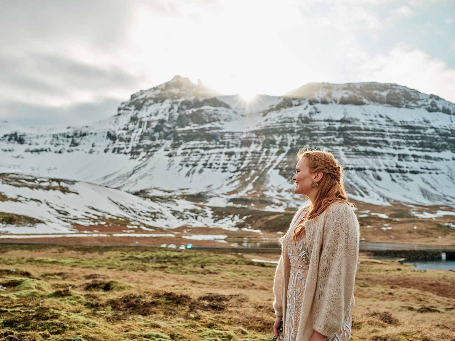 The couple below Kirkjufell at the end of the day, Snæfellsnes