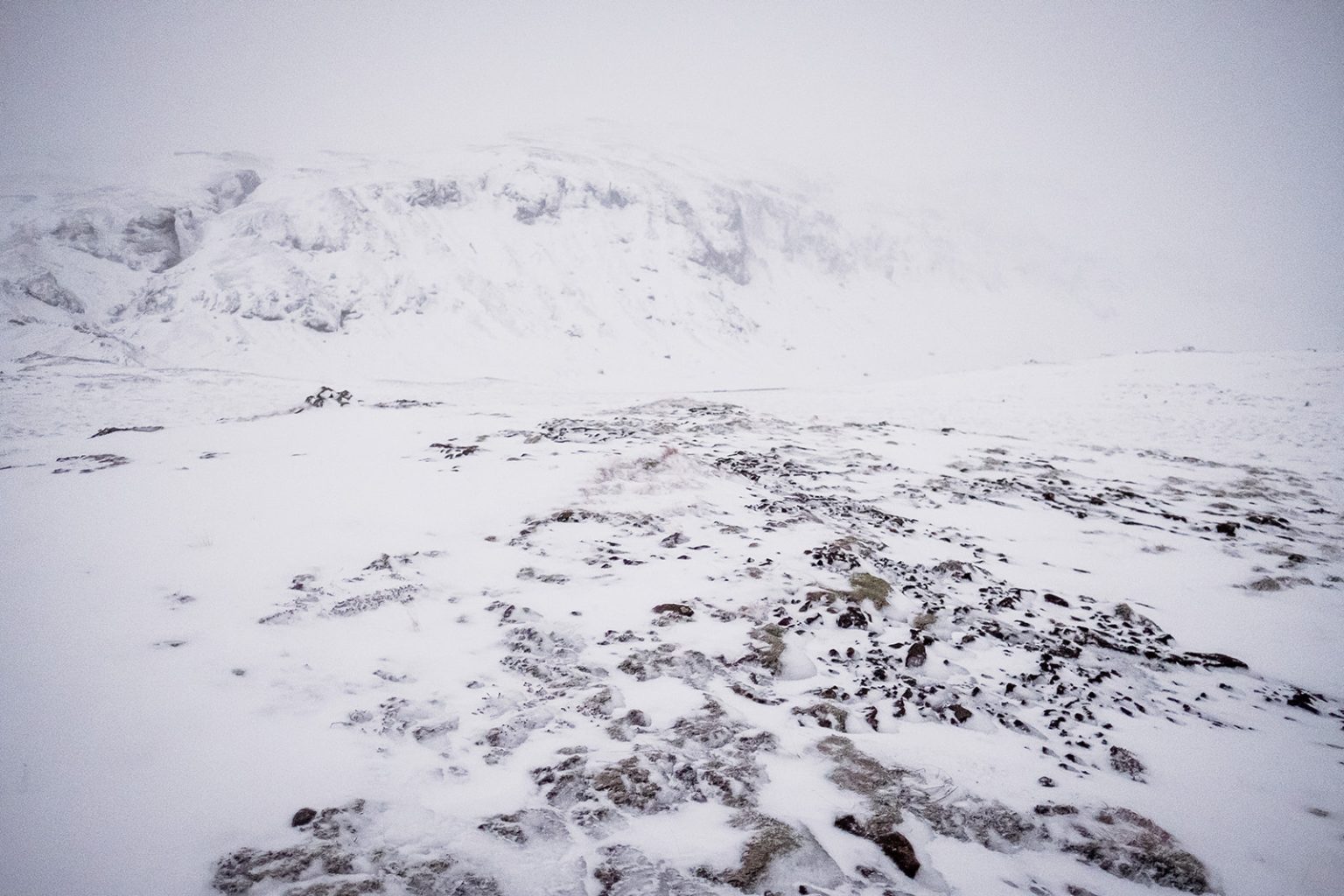 Snow-covered mountains above Hvalfjörður in winter