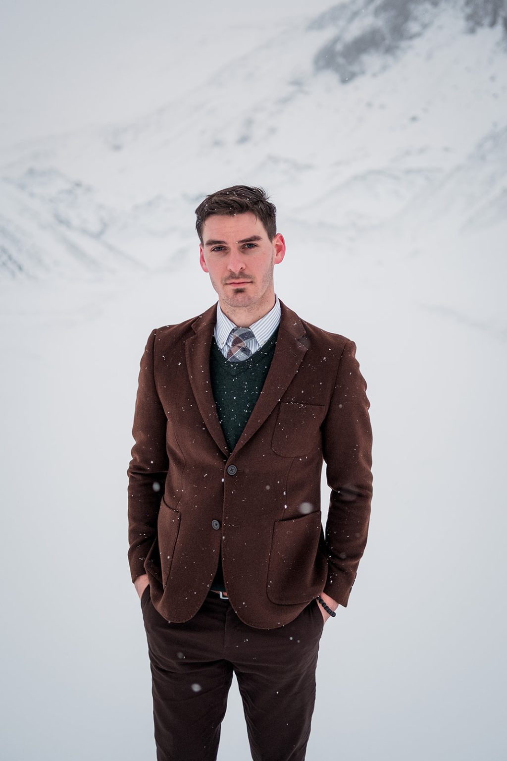 Groom in the snowy Icelandic mountains
