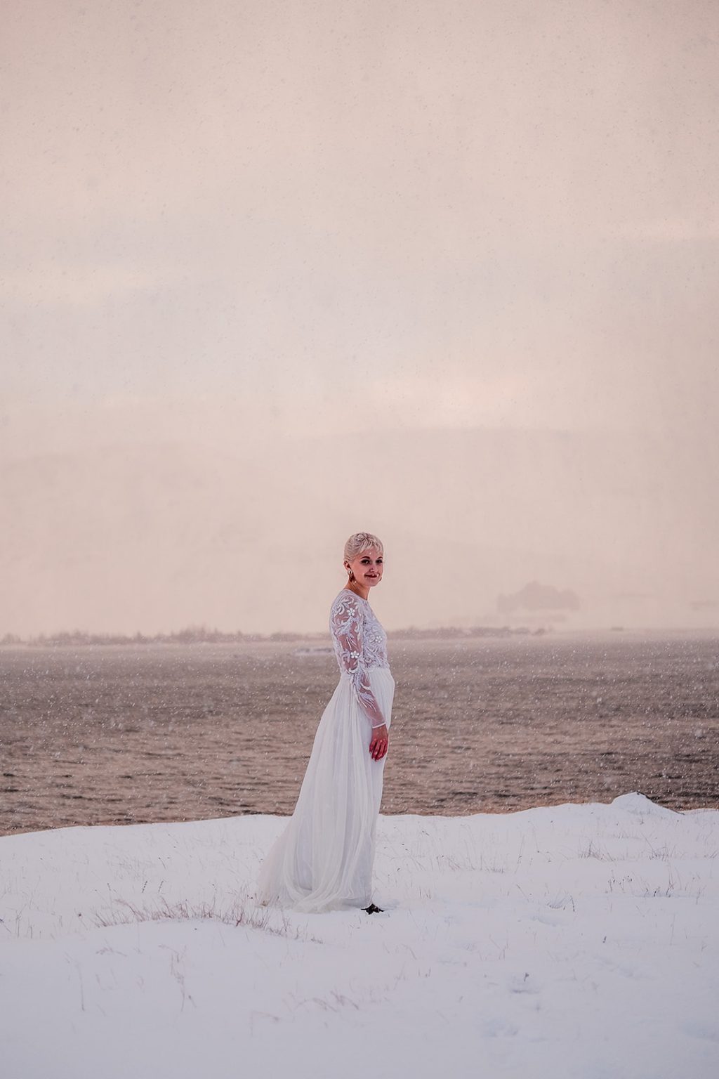 Winter bride portrait on the Icelandic coast