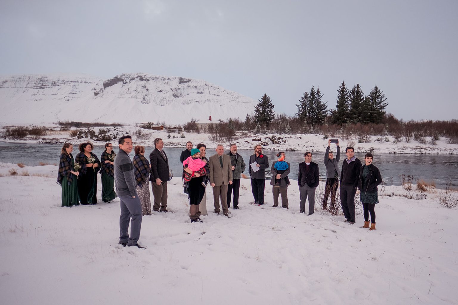 The gathered guests before the ceremony in the snow