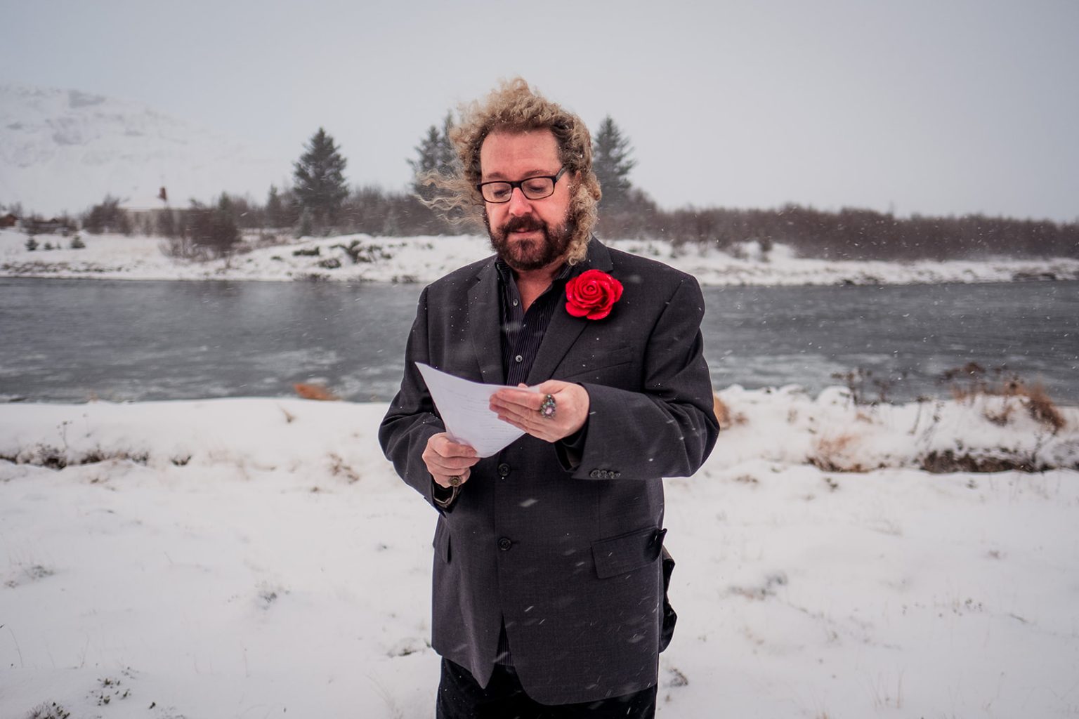 Outdoor winter ceremony by the fjord on the darkest day of the year