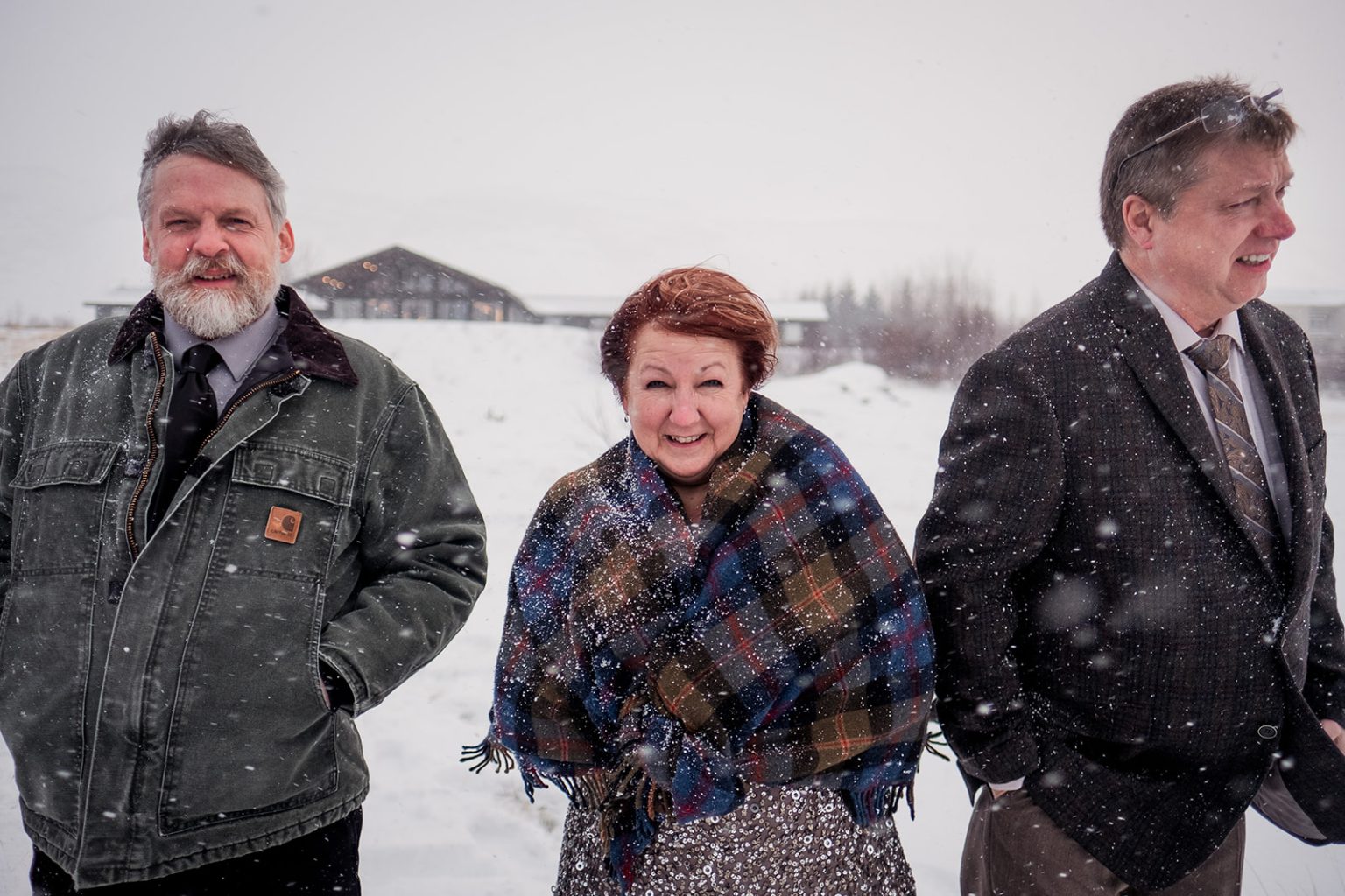 Guests wrapped in wool blankets during the outdoor winter ceremony