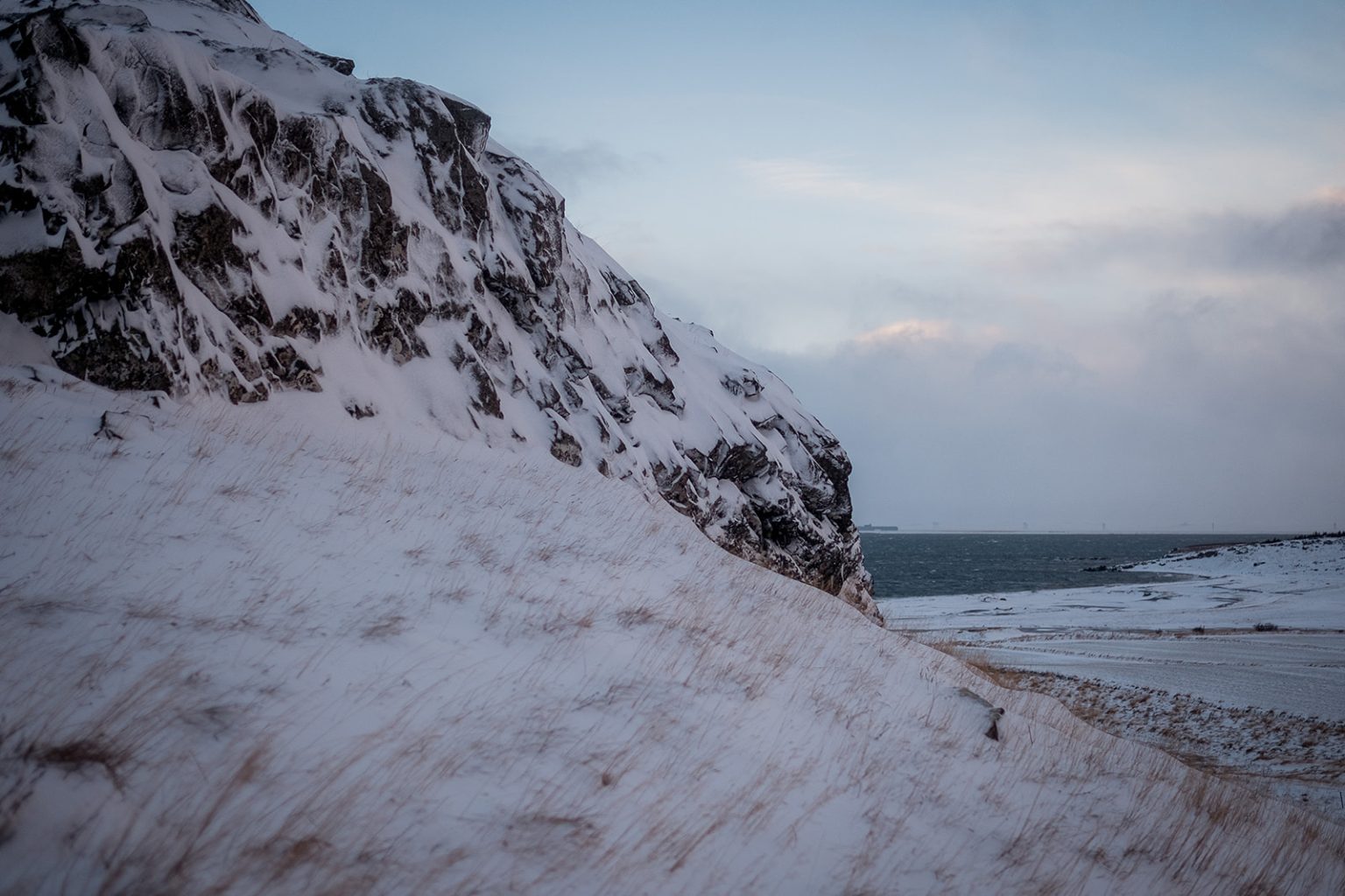 Winter weather over the mountains of Hvalfjörður