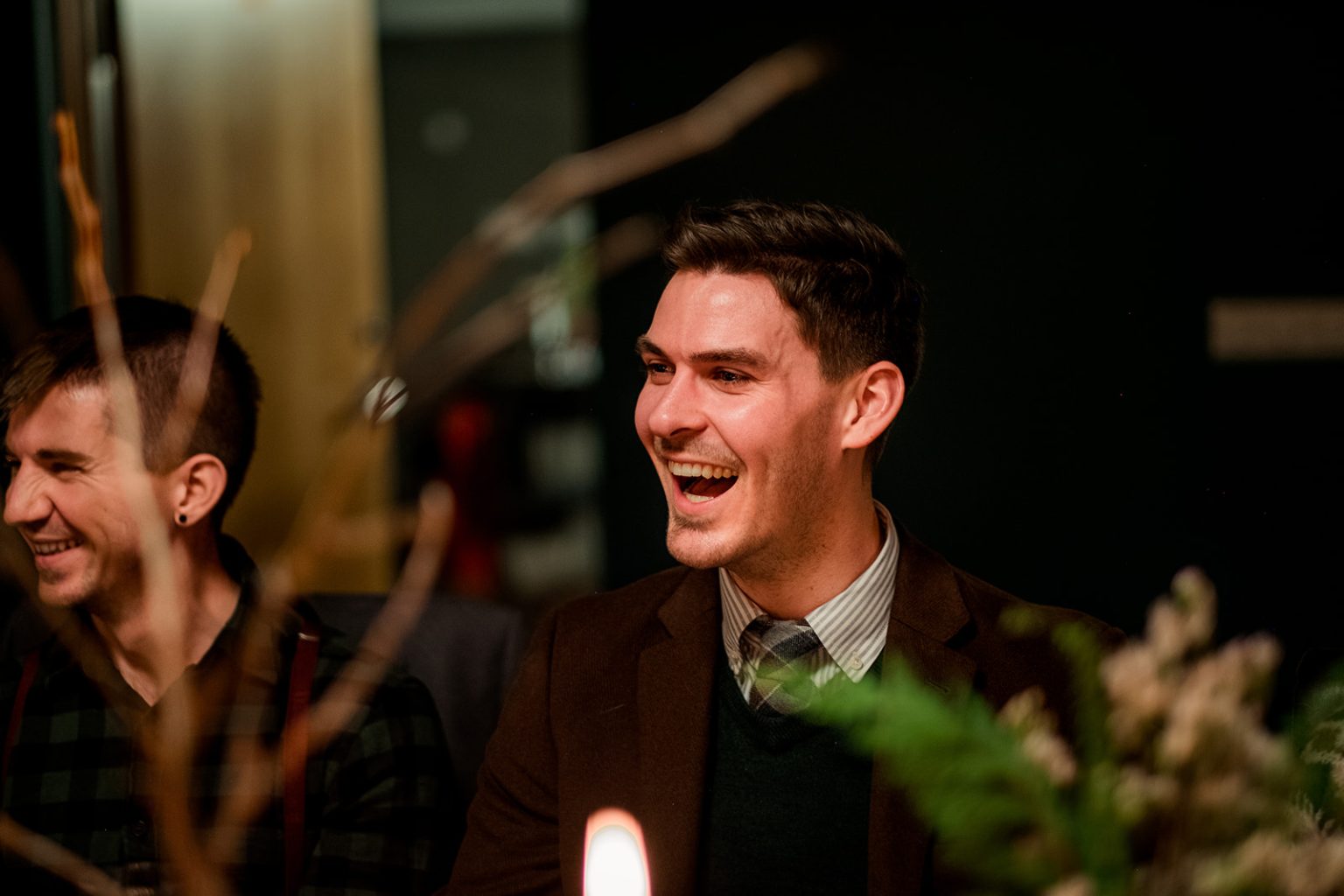 Laughter during the winter wedding dinner in Iceland