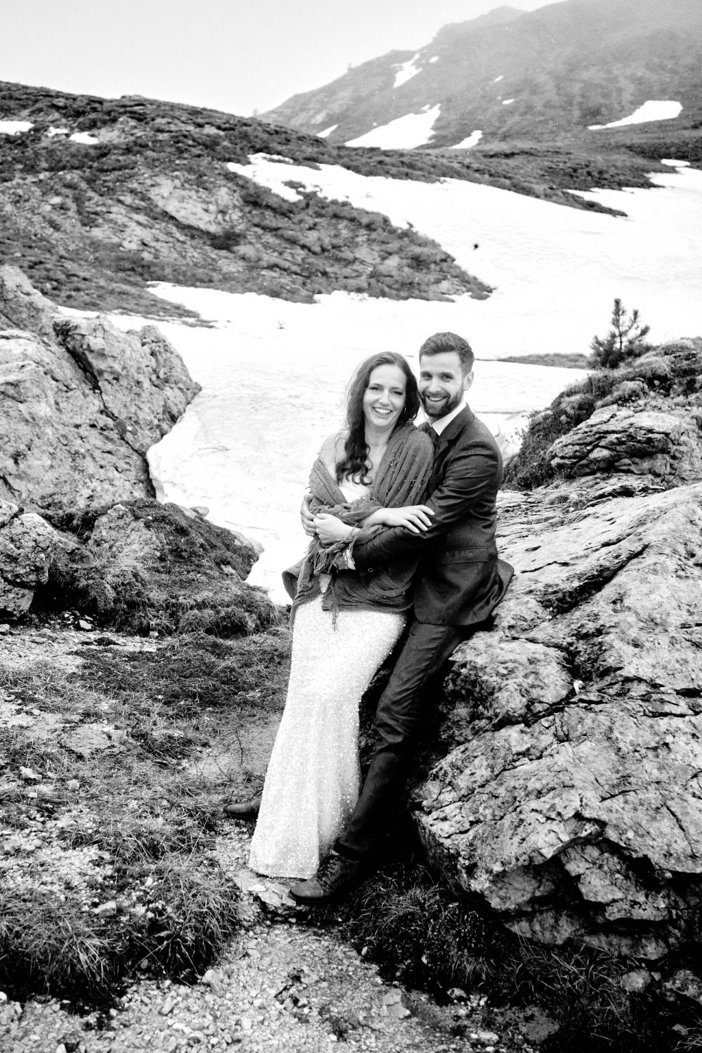 Couple among the rocks in the high country, Dolomites