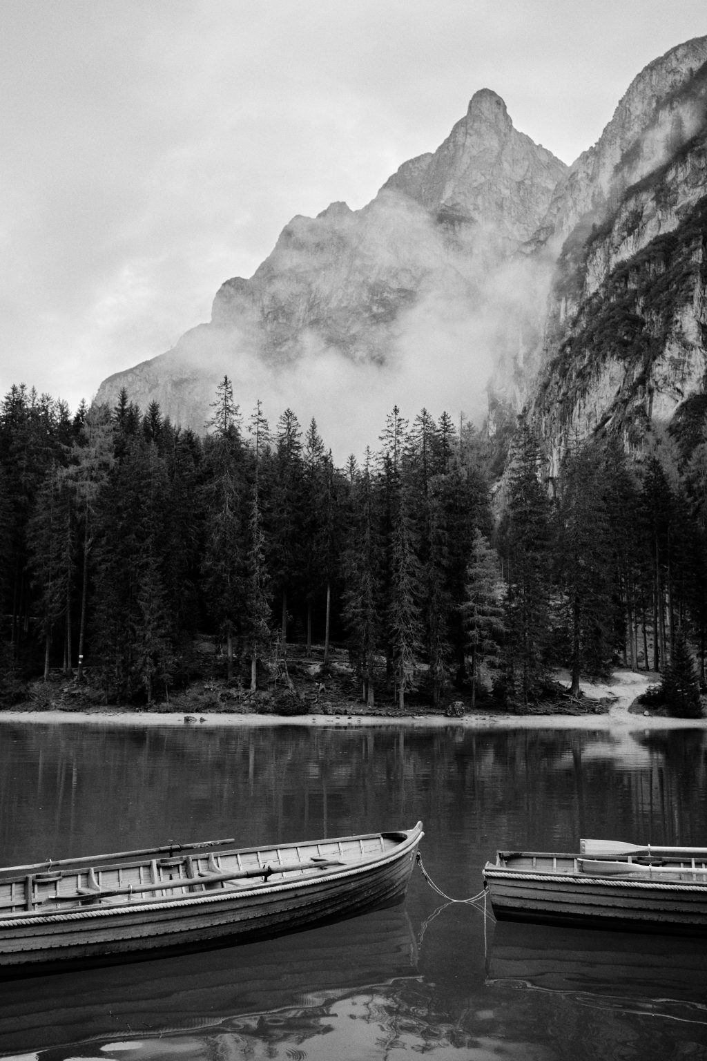 Morning mist over Lago di Braies, Italy