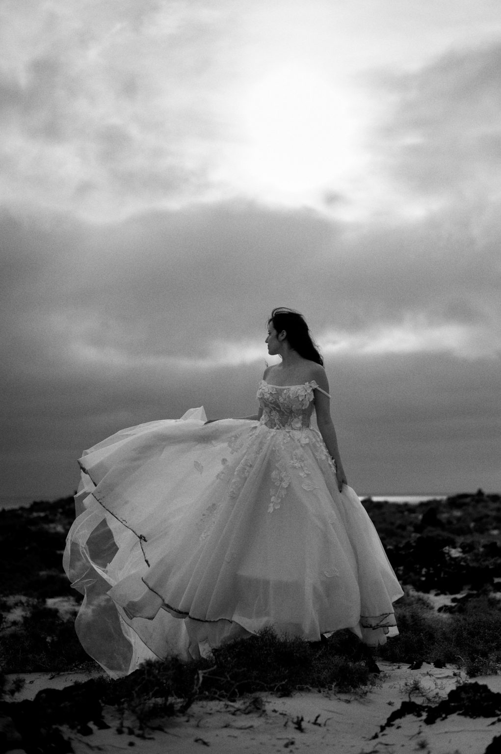 Bride in the wind under a dark sky, Lanzarote