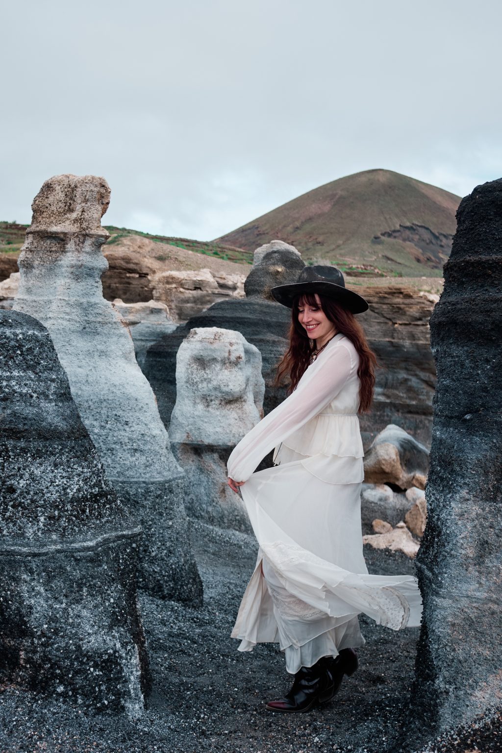 Couple among sculptural lava rock, Lanzarote engagement session