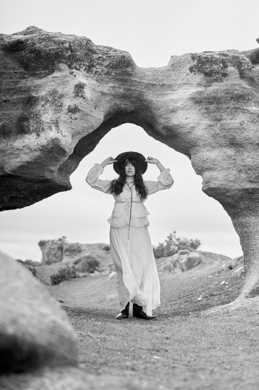 Bride in a rock arch, black and white, Lanzarote