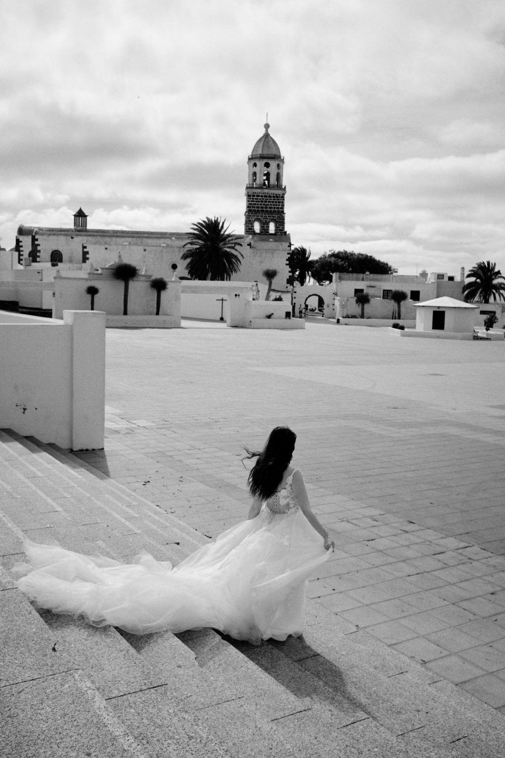 Bride among the white walls of Lanzarote, black and white