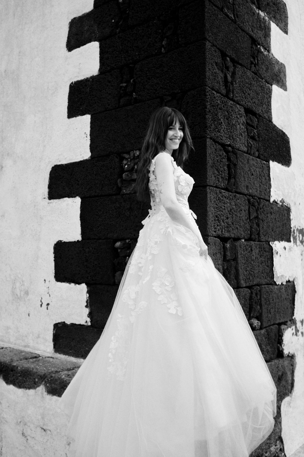 Francesca in a stone doorway, black and white, Lanzarote engagement session