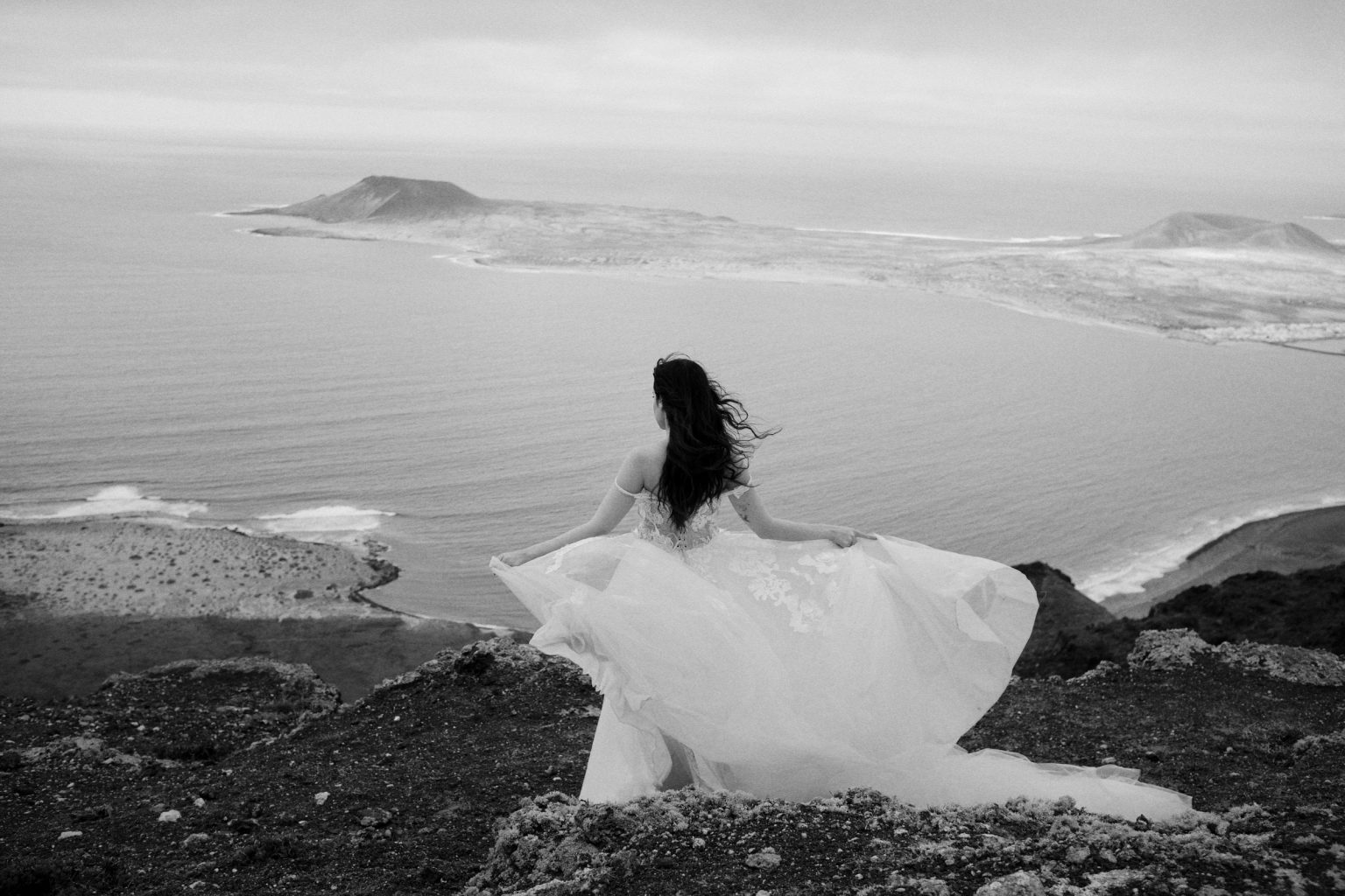 Bride on the cliffs with the sea beyond, Lanzarote