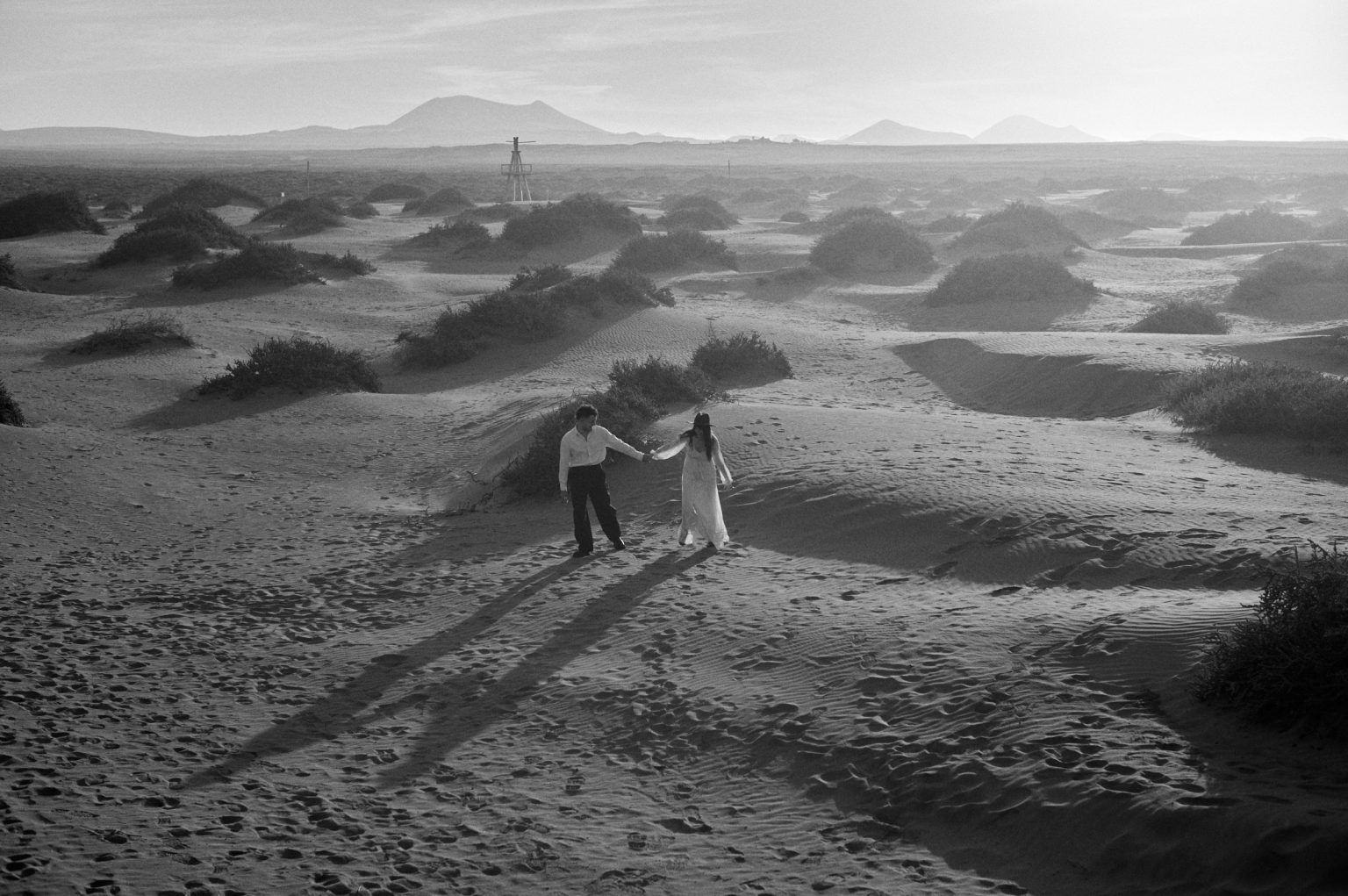 Sand dunes running to the sea, black and white, Lanzarote