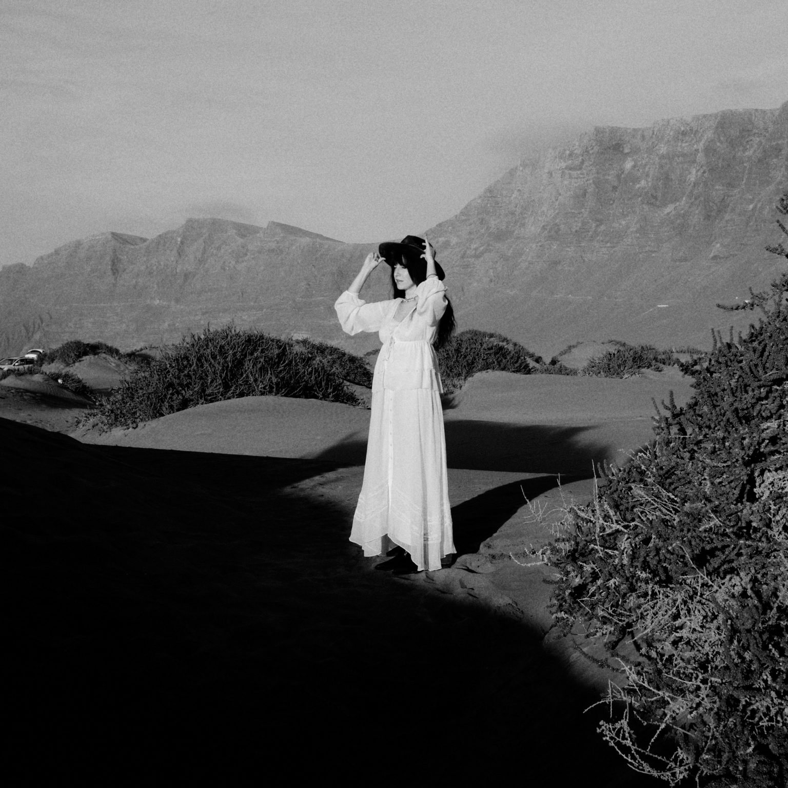 Bride in the dunes at dusk, black and white, Lanzarote