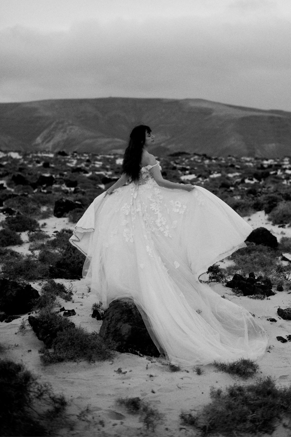 Bride's dress across the rocks, black and white, Lanzarote