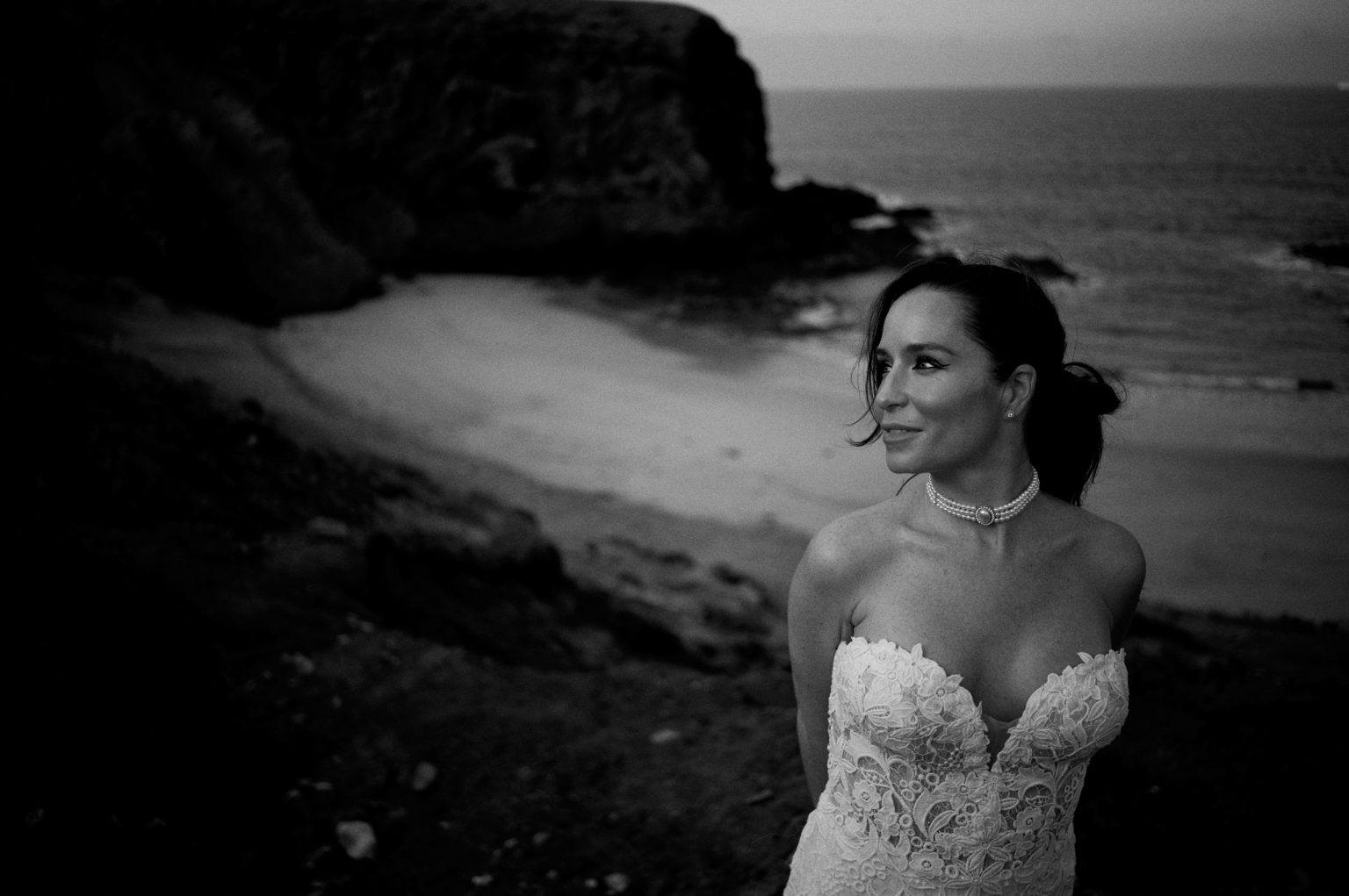 Bride on the rocks, black and white, Lanzarote wedding