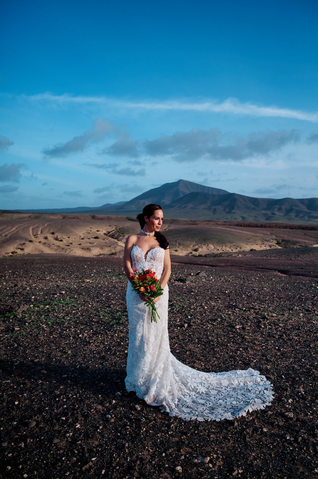 Laura with her bouquet, a volcano behind, Lanzarote wedding