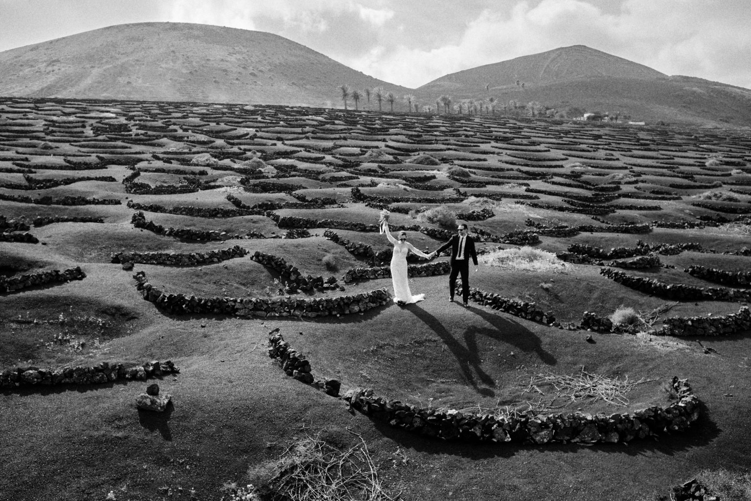 Juan and Laura in the La Geria vineyards, Lanzarote wedding photographer