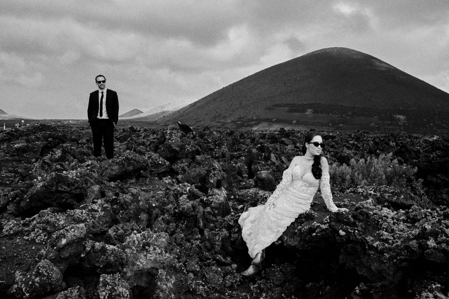 Couple small in the volcanic country of Lanzarote