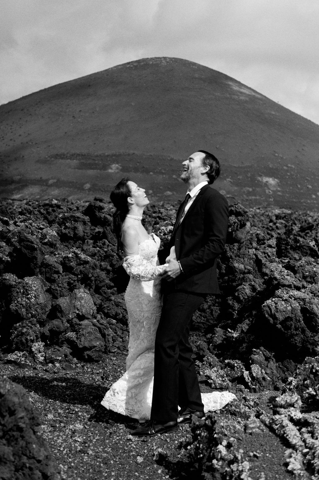 Juan and Laura in the lava, black and white, Lanzarote wedding