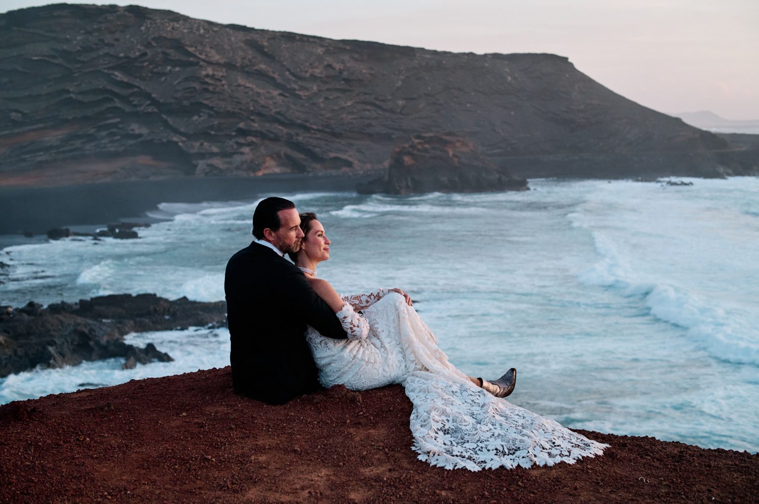 Juan and Laura on the cliffs at sunset over the Atlantic, Lanzarote