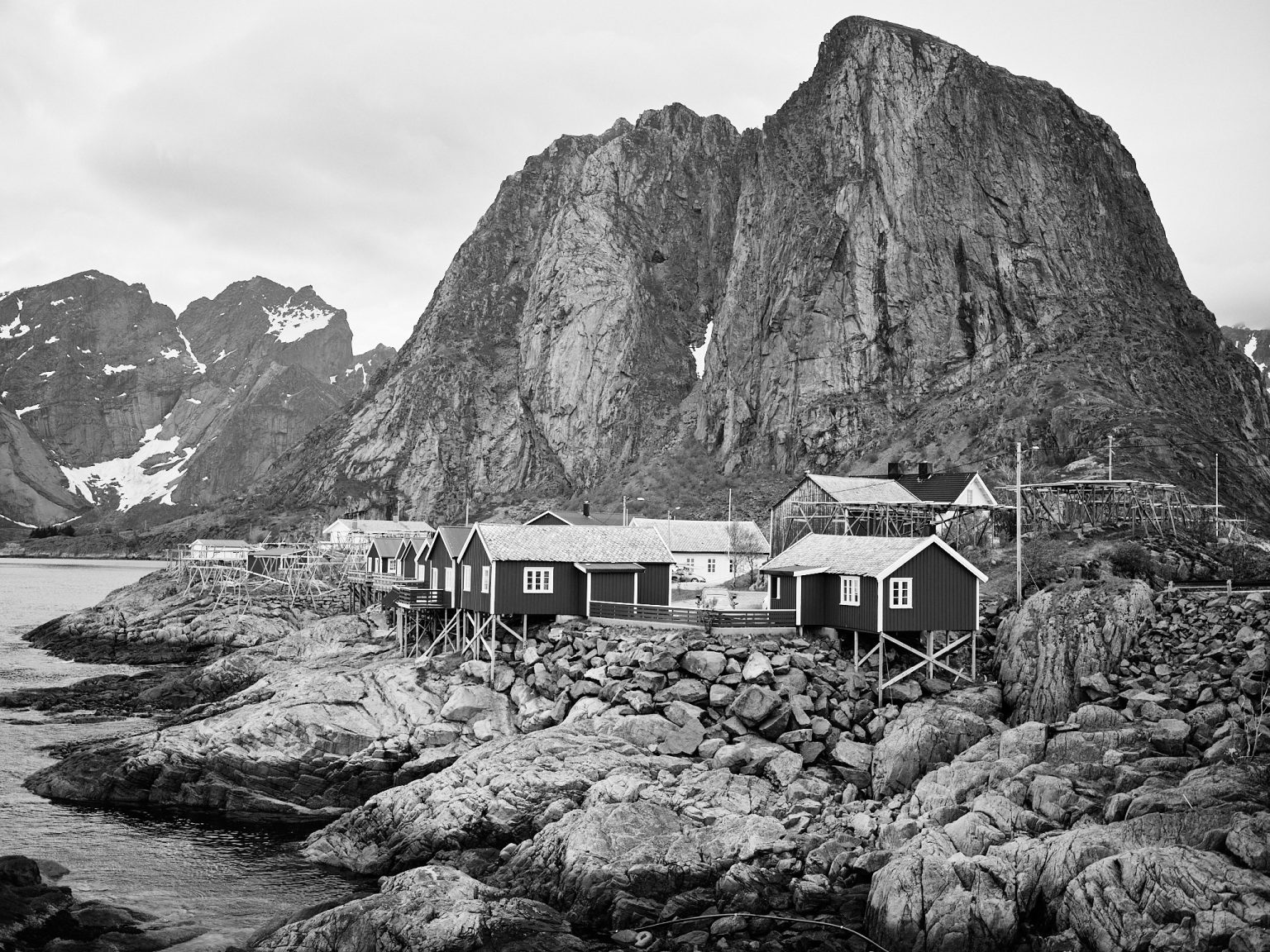 Red rorbu cabins below the peaks near Leknes, Lofoten