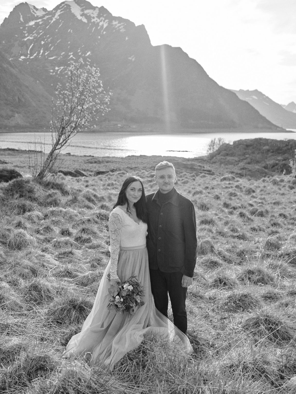 Sophie and Johan by a lone tree, Lofoten, black and white