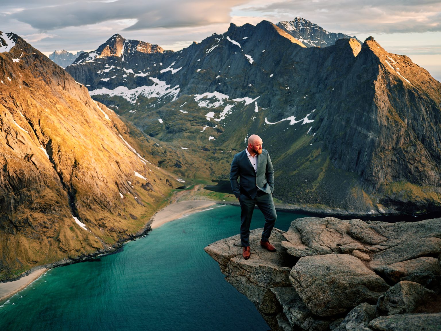 The groom on the summit of Ryten above Kvalvika, Lofoten