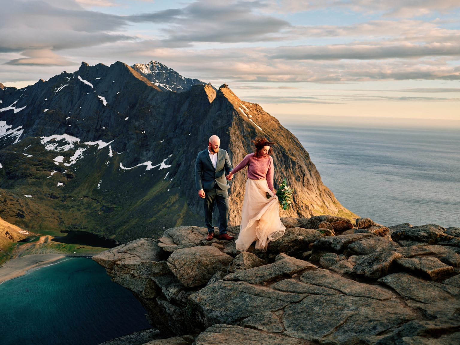 Ine and Jimmy on the ridge at sunset, Lofoten