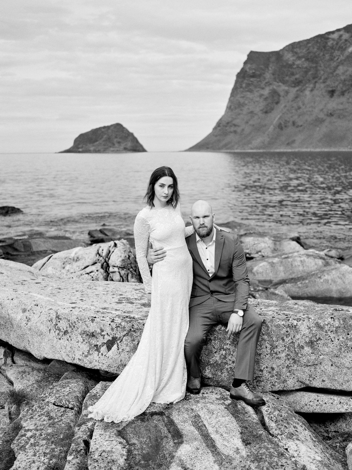 The couple on the rocks by the sea, Lofoten, black and white