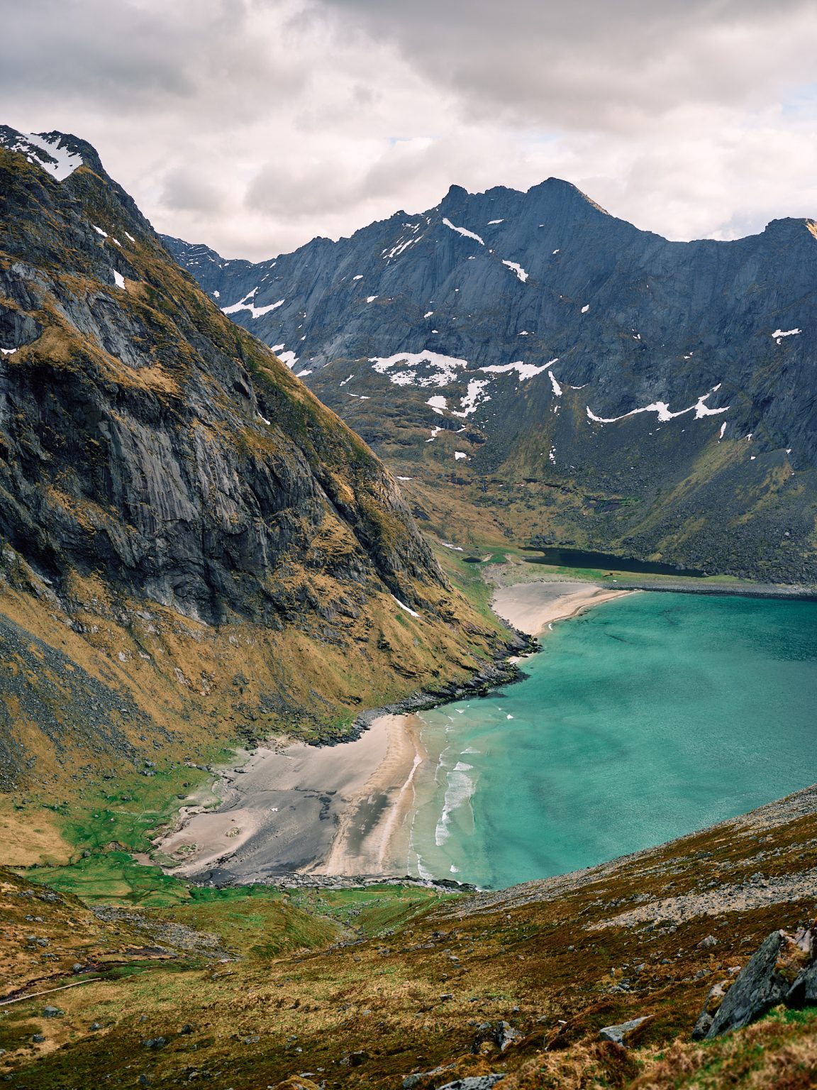 Kvalvika beach and turquoise water seen from Ryten