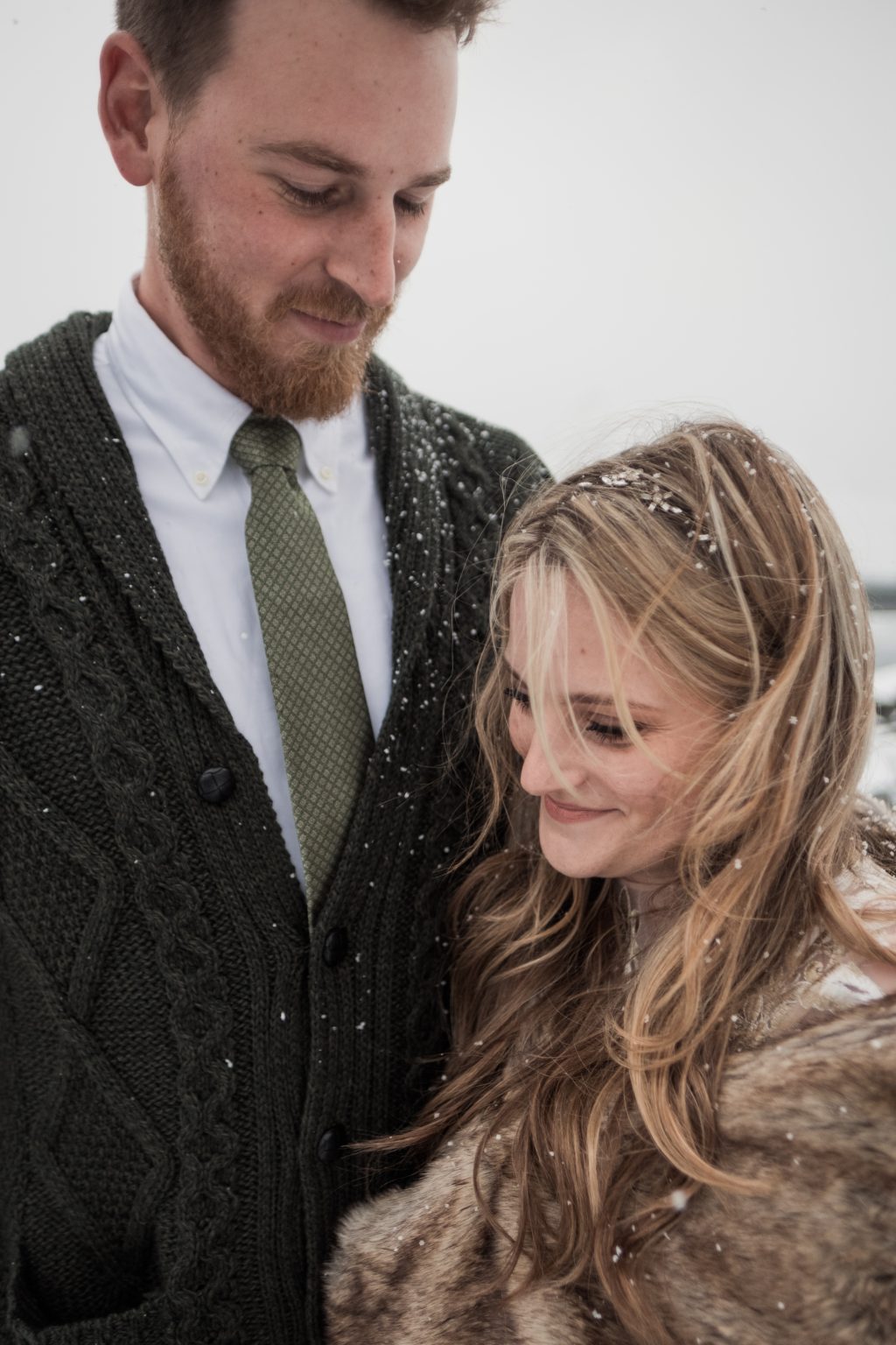 Jamie and Christopher close together, a Lofoten elopement