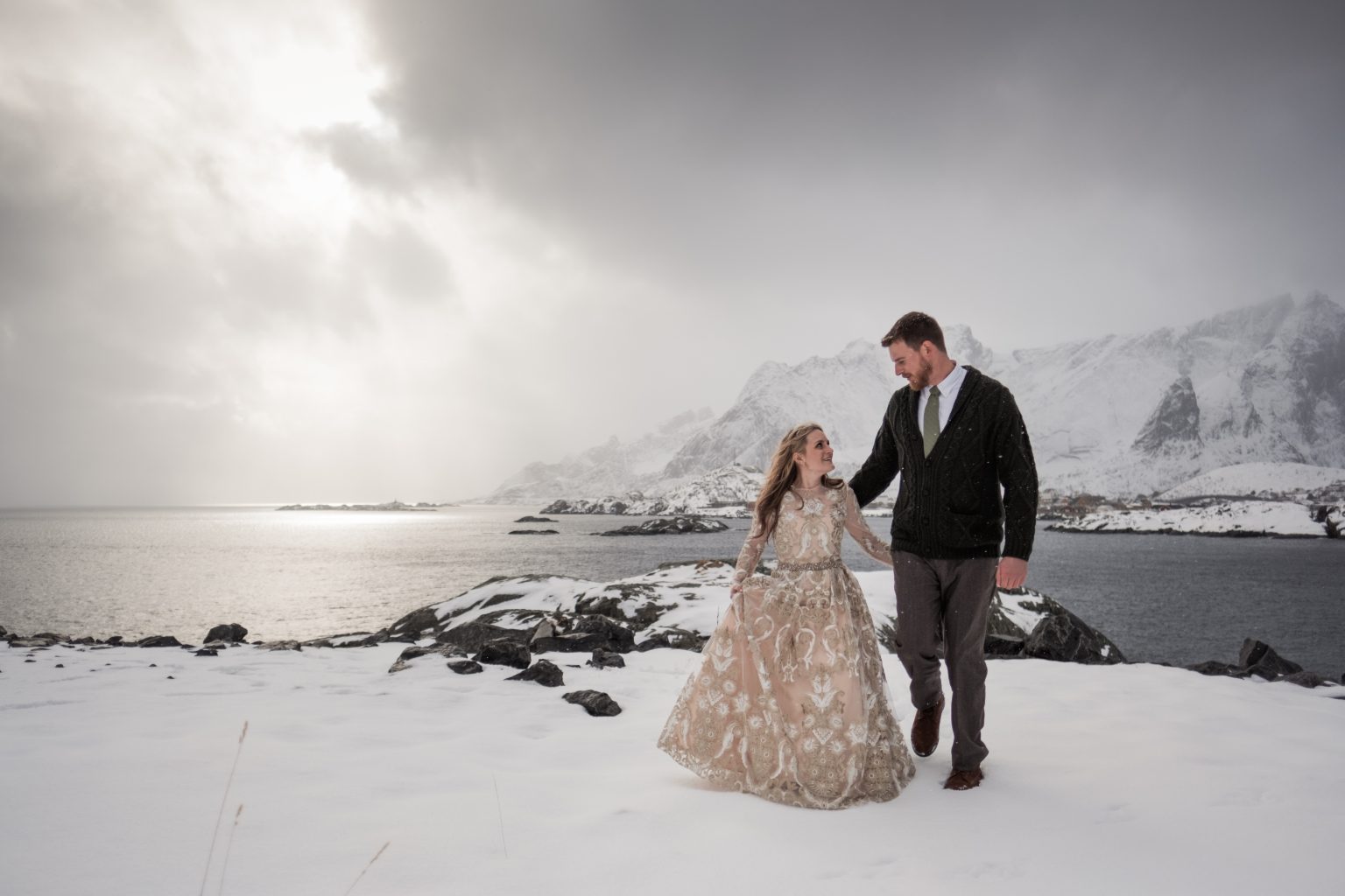 Dancing in the winter light on the shore, a Lofoten elopement