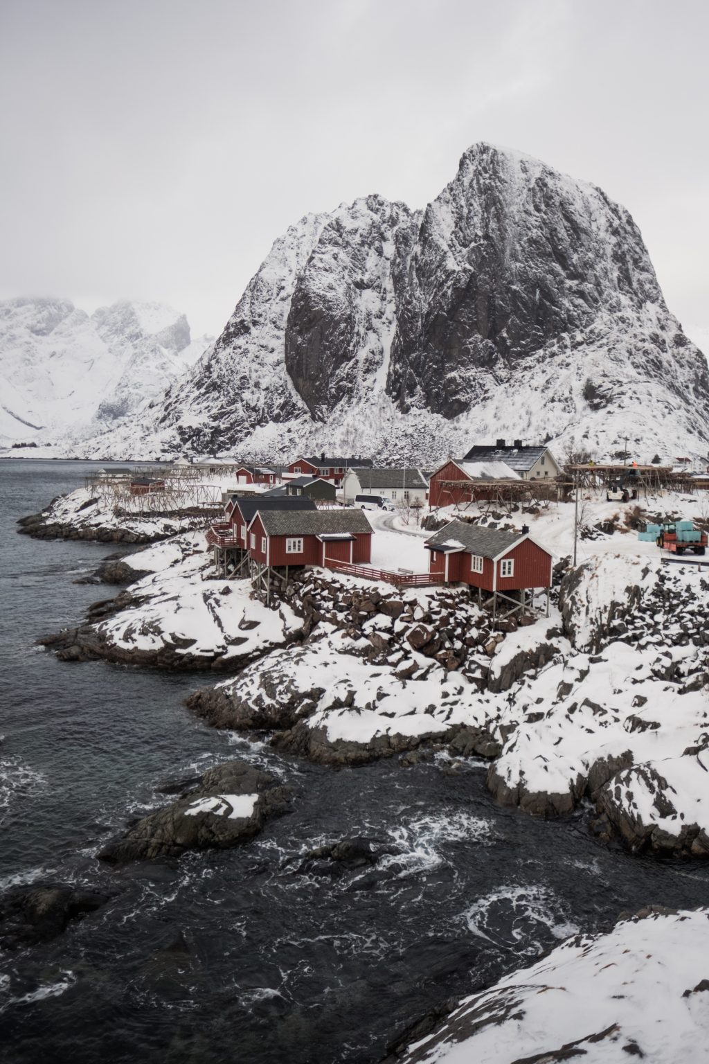 The red cabins and sharp peak at Reine, a Lofoten winter elopement