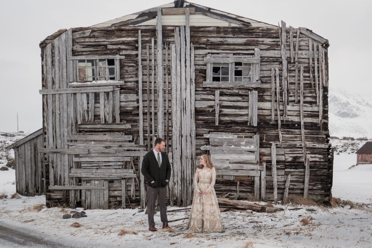 A weathered rorbu in the snow, a Lofoten winter elopement