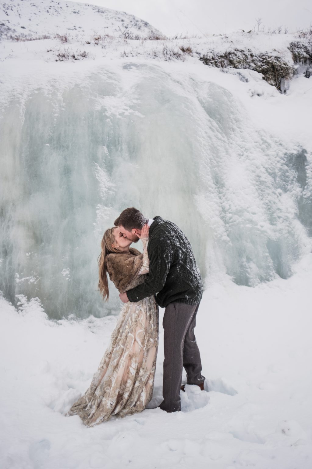 A kiss at the frozen ice wall, a Lofoten winter elopement