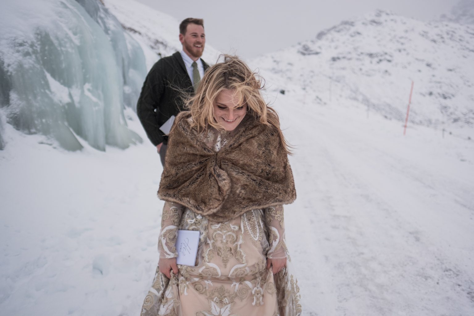 Jamie smiling in a fur wrap in the snow, Lofoten in winter