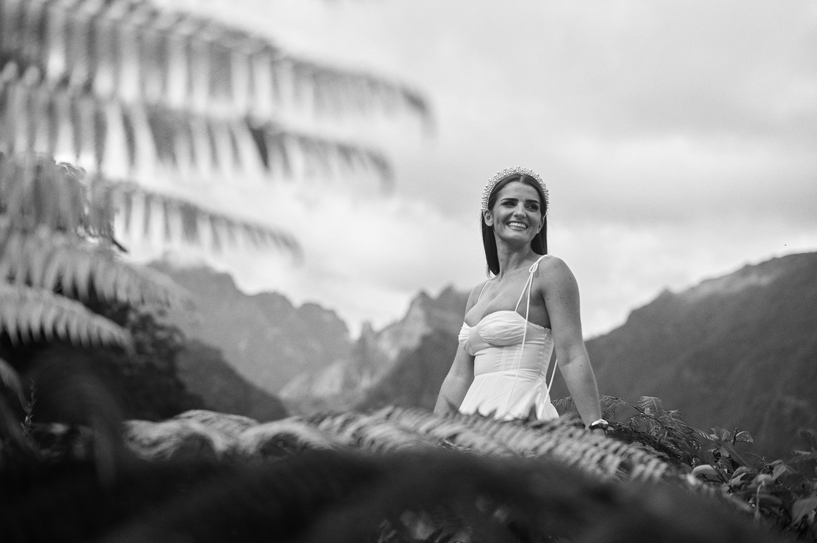 Bride on a ridge in the hills of Madeira in black and white