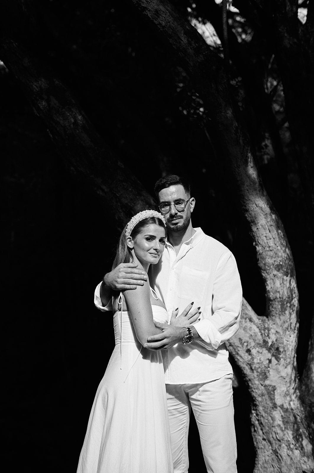 Bride and groom cheek to cheek in the Queimadas forest, Madeira