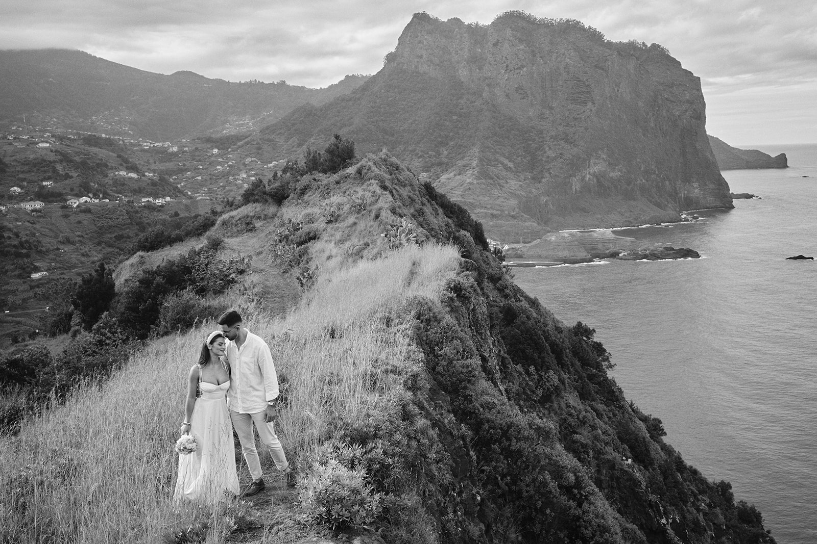 North coast of Madeira from Miradouro do Boqueirão with a couple on the cliffs
