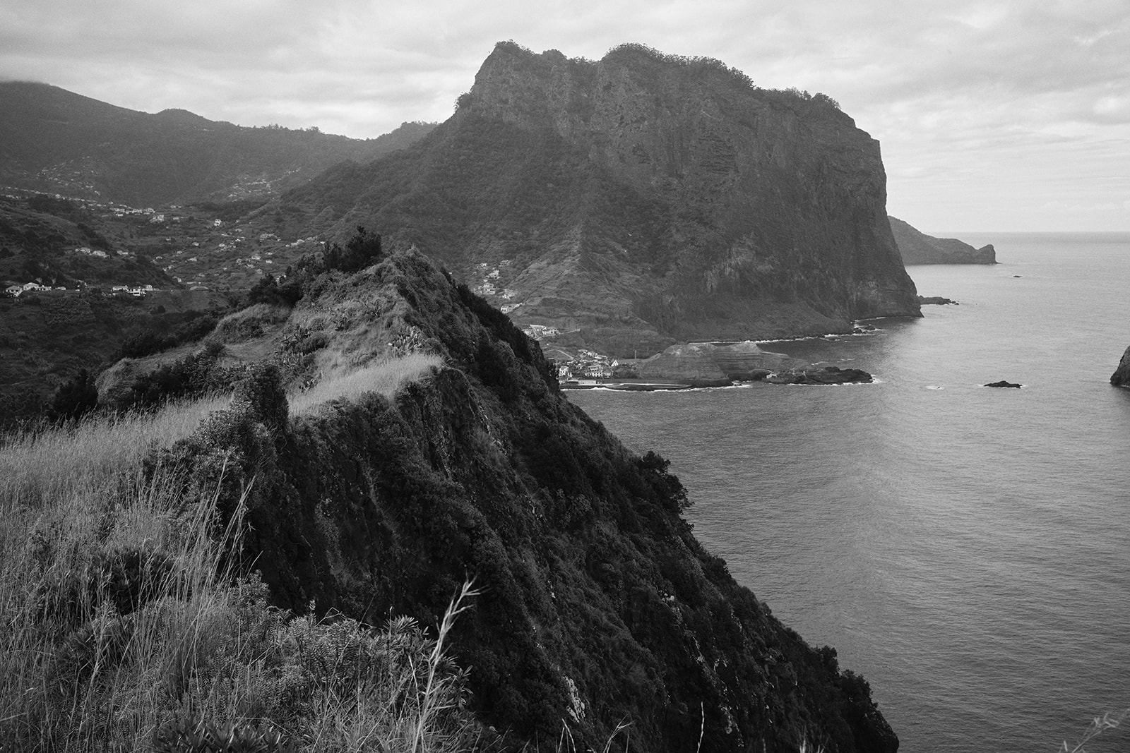 Green headland and the Atlantic at Miradouro do Boqueirão, Madeira