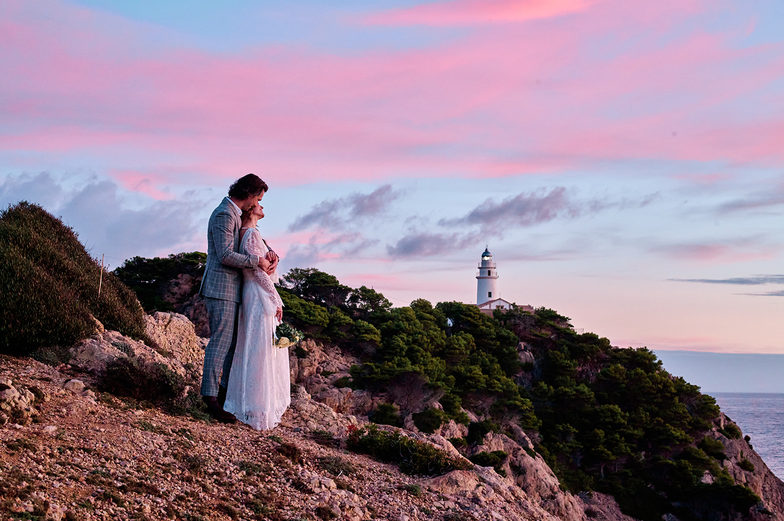 Bride and groom on the east coast of Mallorca at sunrise