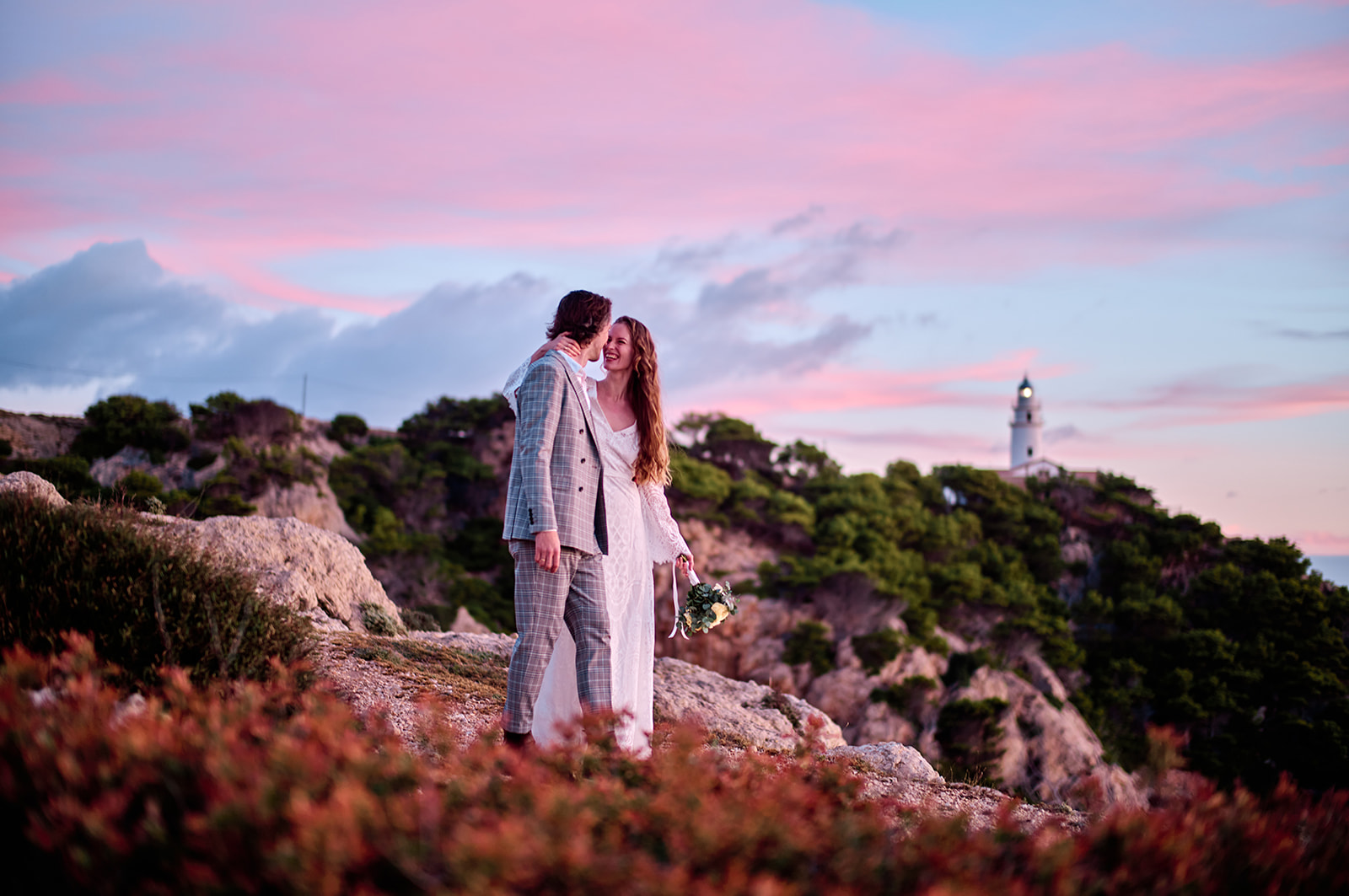Couple at the Capdepera headland at dawn, Mallorca