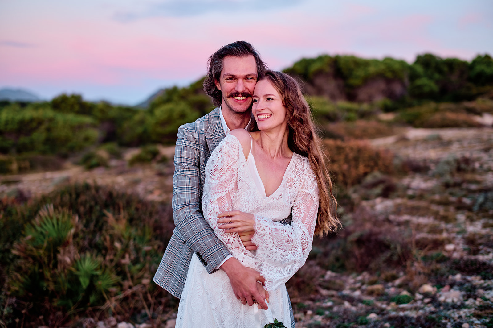 Bride and groom on the east coast of Mallorca at sunrise