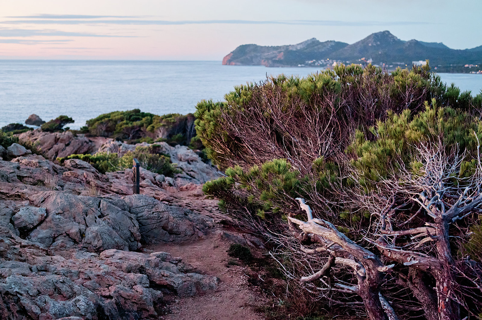 Couple at the Capdepera headland at dawn, Mallorca